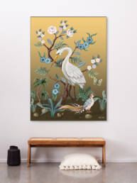 Katoenen wandkleed in frame met grote witte vogel erop.